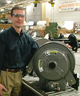 Eric Hannay (from Hannay Reels) with 2 millionth reel at the Hannay Reels assembly line