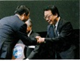 Nachi Fujikoshi President Honma receiving award from Toyota Motor Corporation President Akio Toyoda.